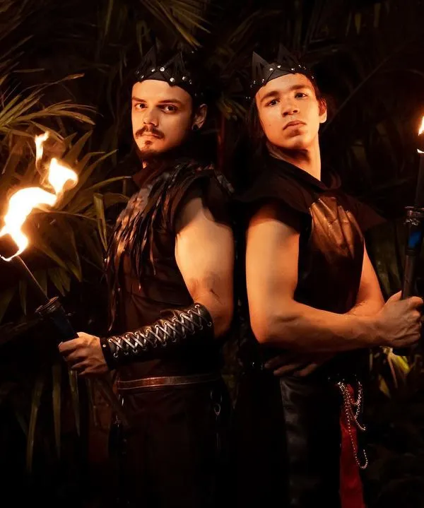 A portrait of our "two brothers" duo act. Their coordinated look and intense presence promise a powerful and epic synchronized fire show.