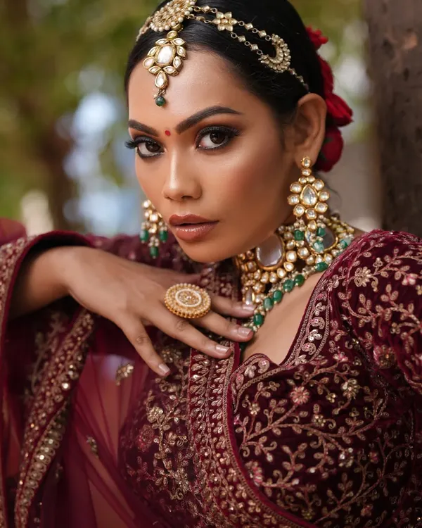 This is the level of perfection we train our students to achieve. This stunning bridal look, created for a final portfolio shoot, showcases mastery in achieving a flawless base, intricate eye makeup, and elegant hair styling that is ready for a high-end wedding.