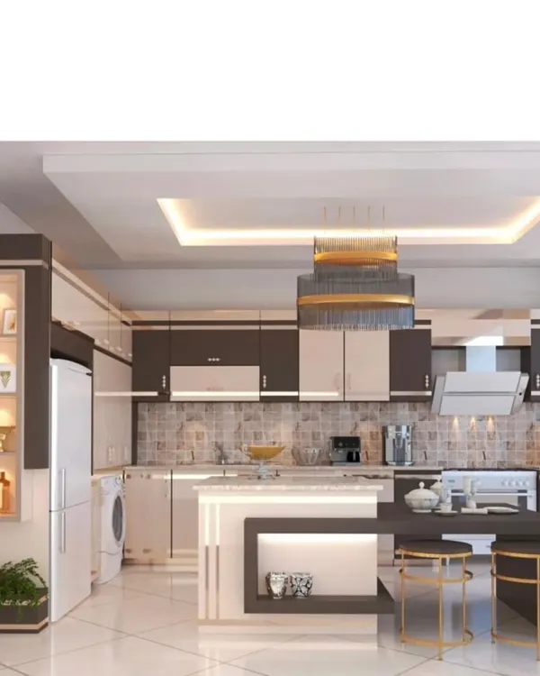 A perfect example of a modern kitchen with an island. I used a combination of dark and light laminates for the cabinets, a durable countertop, and a stylish chimney. The false ceiling with recessed lights provides excellent illumination for the entire space.