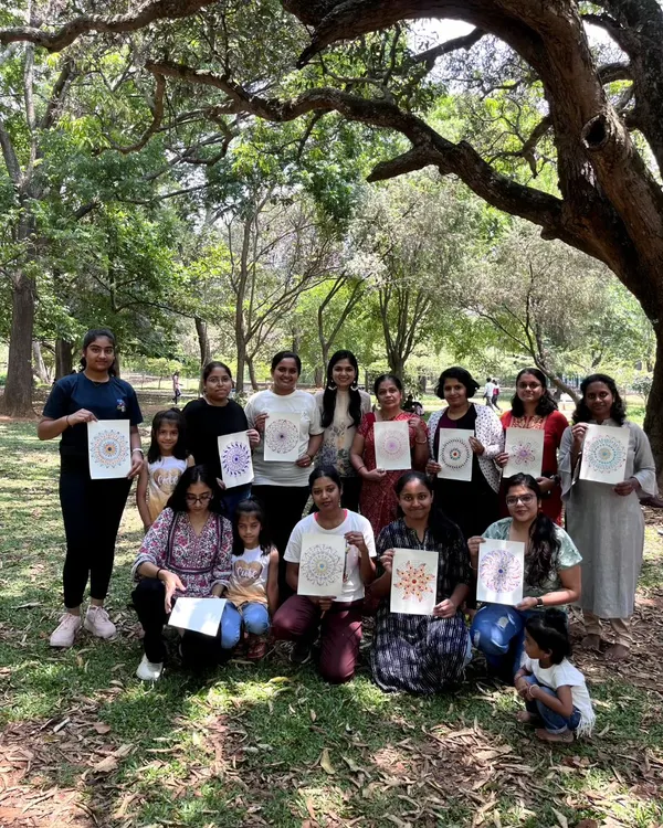 A wonderful group photo from our Dot Mandala workshop. It's always amazing to see people of all ages and skill levels come together to create something beautiful.