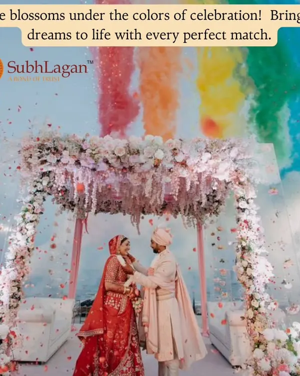 A moment of pure joy as the couple exchanges garlands during the Varmala ceremony. We believe in creating matches where celebrations are as vibrant and colorful as this, marking the start of a happy life together.