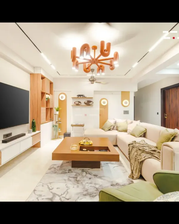 This living room embodies my design philosophy of creating spaces that are both luxurious and livable. The warm, earthy tones, combined with a statement terracotta chandelier and ample natural light, create an inviting atmosphere perfect for connection and relaxation.