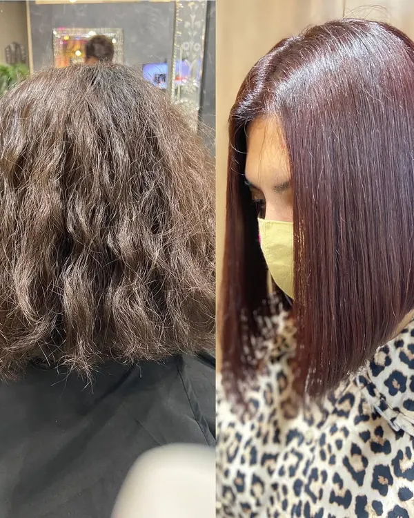 This is what we call a hair reset. We transformed this client's frizzy, unmanageable hair into a sleek, healthy-looking bob using a targeted anti-frizz treatment that adds incredible shine and smoothness.