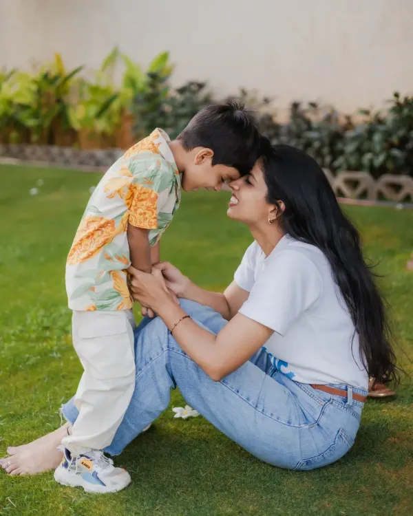 I love capturing these quiet, in-between moments. This tender forehead touch between a mother and her son during an outdoor family photoshoot is a perfect example of the pure, unscripted love I aim to freeze in time.
