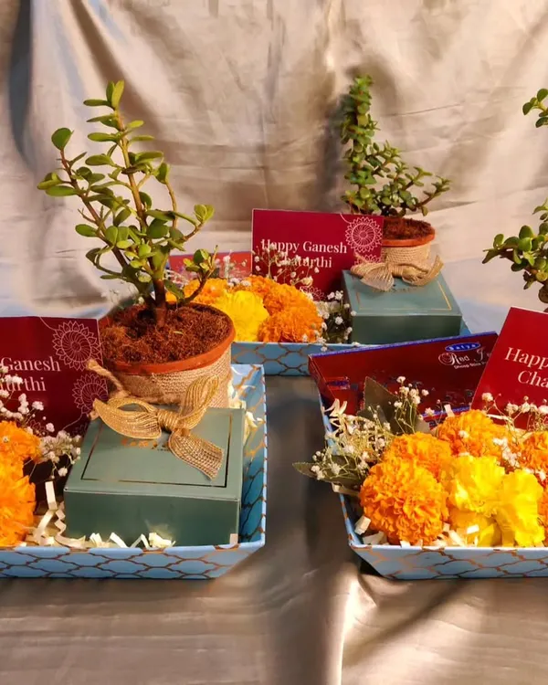 Ganpati Bappa Morya. I was delighted to create these hampers for Ganesh Chaturthi darshan, including a plant, a box of modaks, dhoop sticks, and fresh flowers.