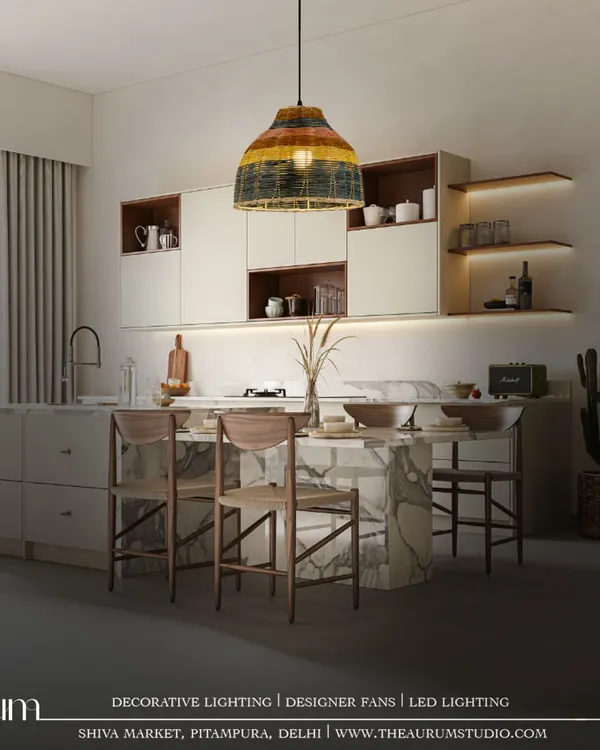 This colorful wicker pendant adds a unique, artisanal touch over the kitchen island. It’s a perfect example of how I use custom lighting to bring a new dimension of sophistication and personality to a functional space.