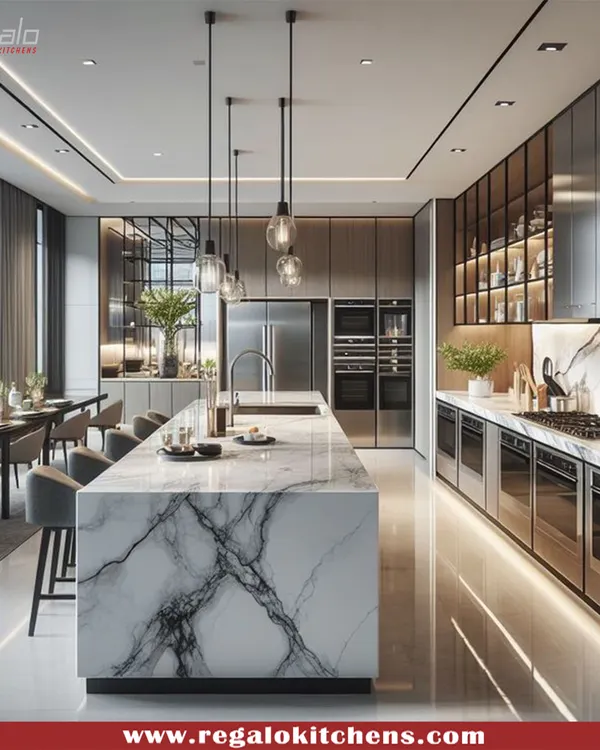 This is the heart of modern living. We designed this expansive kitchen around a magnificent marble island that serves as both a workspace and a social hub. The seamless integration of appliances and handle-less cabinetry creates a clean, minimalist aesthetic, perfect for open-concept homes.