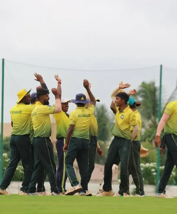 A team celebrates taking a crucial wicket during the Sindoor Friendship Cup. This image captures the competitive spirit and camaraderie of the open-age tournaments we host.