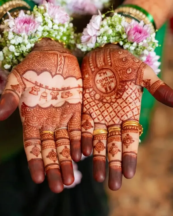 Celebrating a new life with special baby shower mehendi. I designed this with cute motifs like a baby cradle and the sweet message 'I'm Coming Soon' to make the mom-to-be's celebration even more memorable.