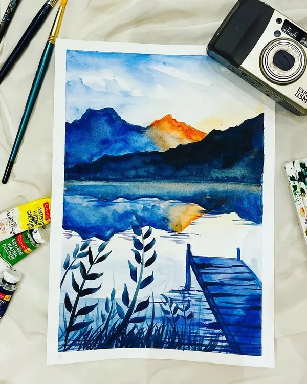 This peaceful lakeside dock painting is a favorite from my online watercolor course. We focus on blending blues and creating realistic reflections in the water.