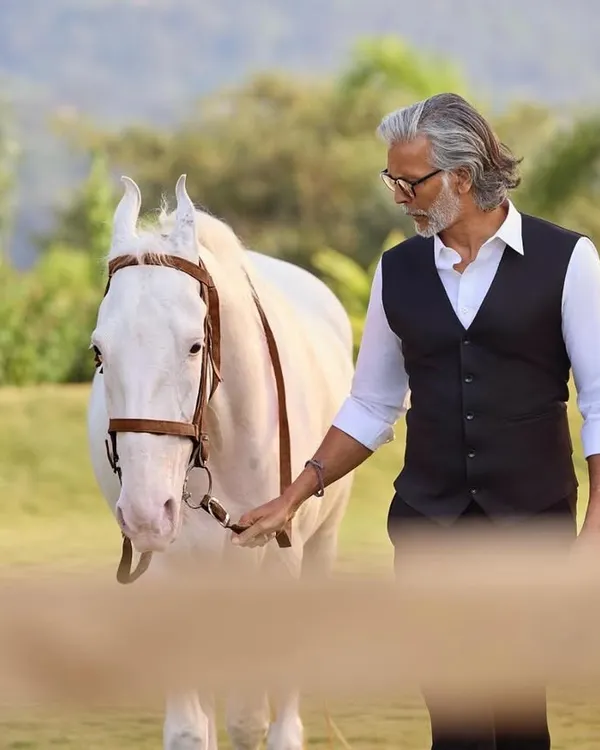 For the same campaign with Milind Soman, I styled this more relaxed but equally sophisticated look. A sharp waistcoat over a crisp white shirt creates a look of rugged elegance, perfect for the outdoor setting.