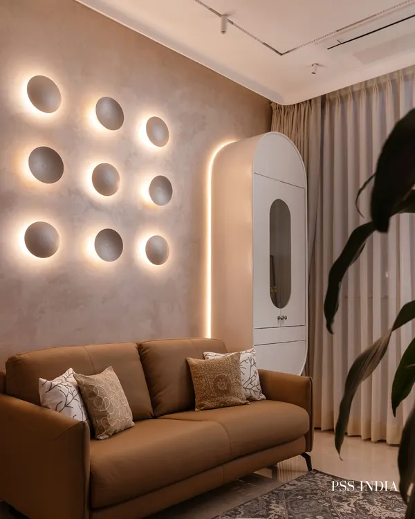 This bedroom is an exercise in soft luxury. I used a palette of grounded neutrals and sculpted textures, like the backlit concave discs on the wall, to create a space that feels both artistic and deeply calming.
