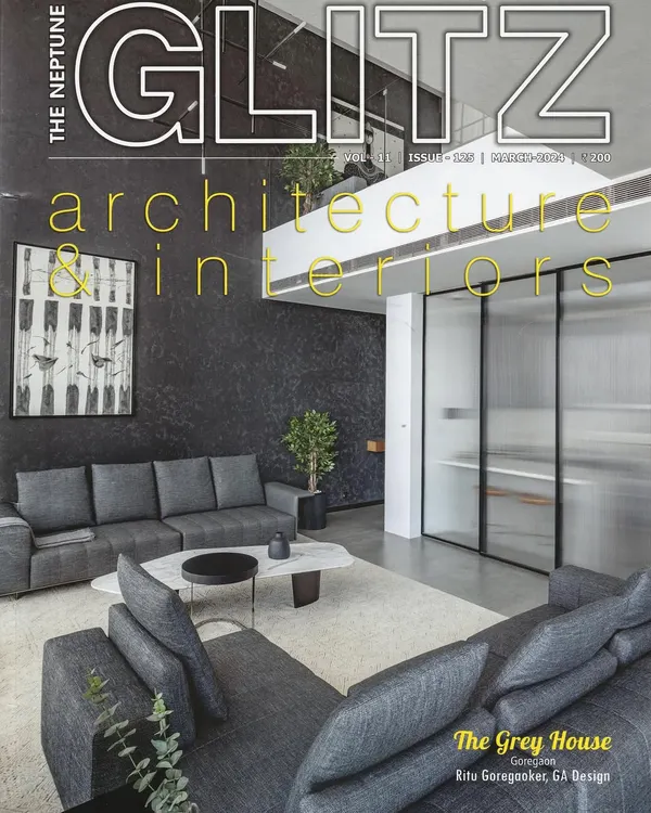 We are proud to have our project, 'The Grey House', featured on the cover of The Neptune Glitz magazine. This image captures the essence of the home's elevated minimalism and the interplay of light and texture in the double-height living space.