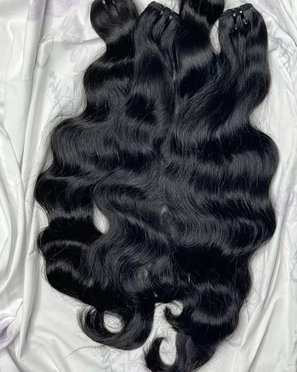 The rich texture and natural wave of my premium black human hair extensions. This is the quality you can expect in every set.