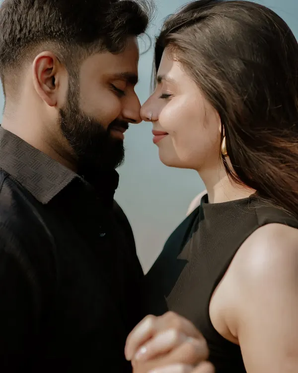 This is the kind of moment I live to capture. No posing, just a quiet, intimate connection between two people. This close-up portrait shows the gentle trust and affection that is the foundation of their story.