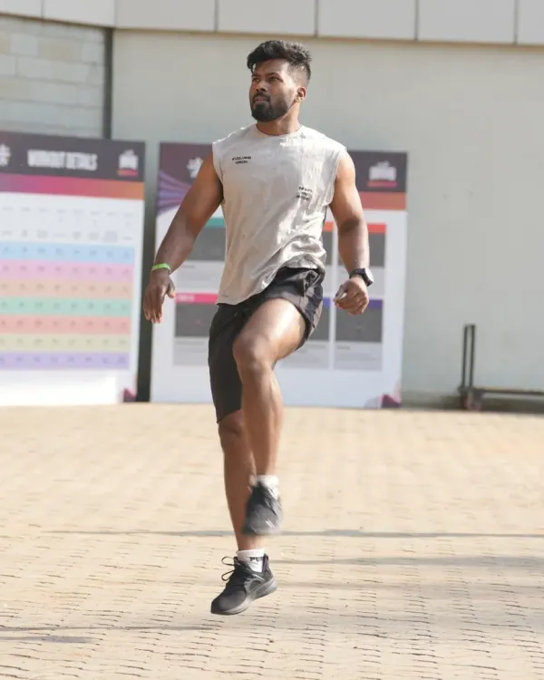 A high-knee drill in action. This is a dynamic warm-up exercise I use to improve coordination and activate the leg muscles before a tough workout.