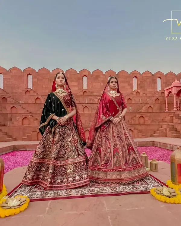 This is what dreams are made of. Two of my stunning royal bridal lehengas, featuring intricate embroidery and rich fabrics, perfect for a bride who wants to make a grand entrance. These pre-loved pieces offer a sustainable way to achieve a high-end wedding look.