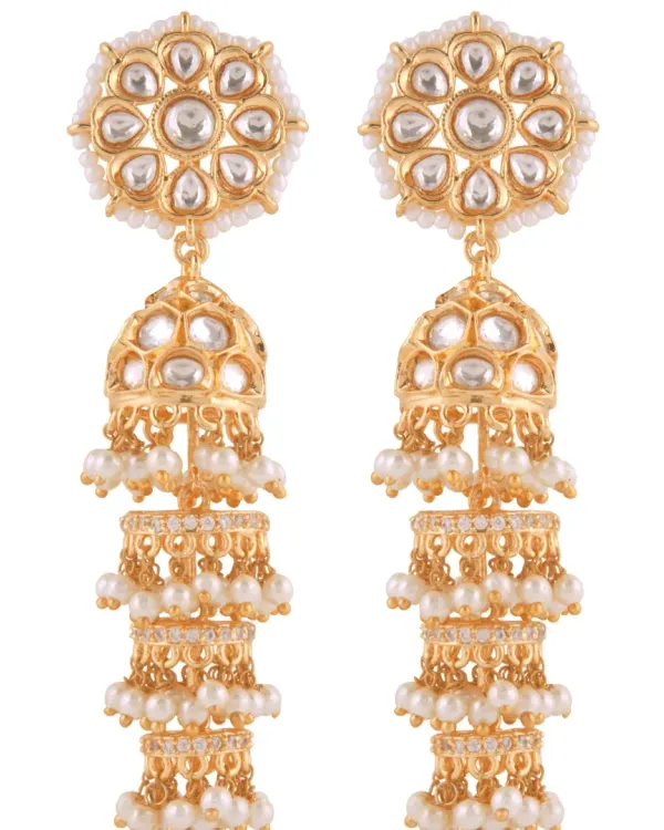 A crisp, front-facing product shot of gold and pearl tiered jhumka earrings on a white background, perfect for a primary e-commerce listing image.