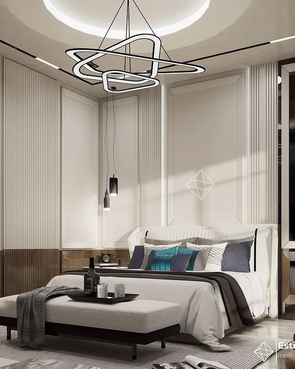 This bedroom concept combines classic wall paneling with modern elements for a timeless feel. The statement chandelier and layered lighting create a warm and inviting ambiance, perfect for a restful retreat.