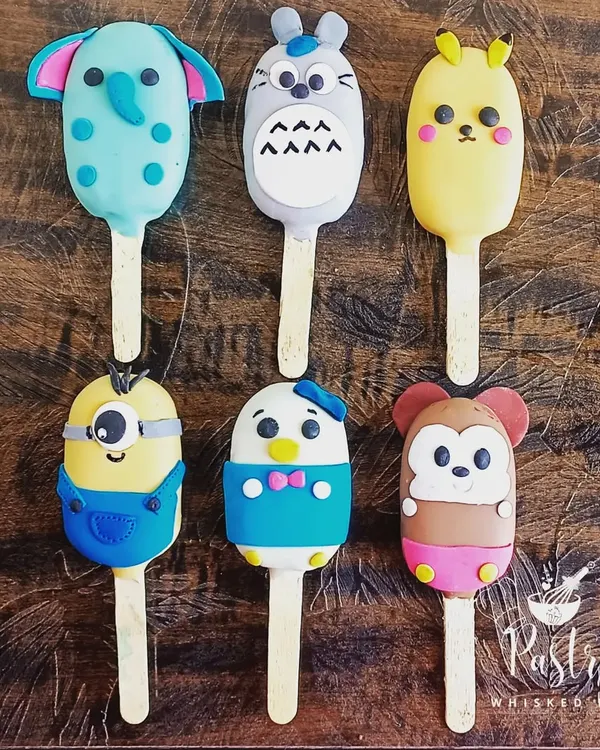 How cute are these character cakesicles? They are perfect for kids' parties and can be customized with their favorite cartoon characters like Totoro, Pikachu, Minions, and more.