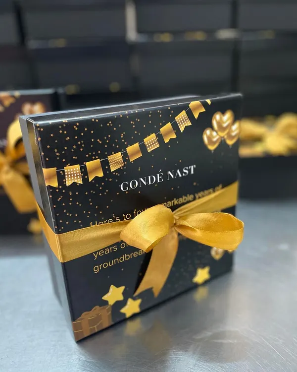 A closer look at the custom branded gift boxes we created for Condé Nast. We believe the packaging is just as important as the treats inside, ensuring a premium unboxing experience for every recipient.