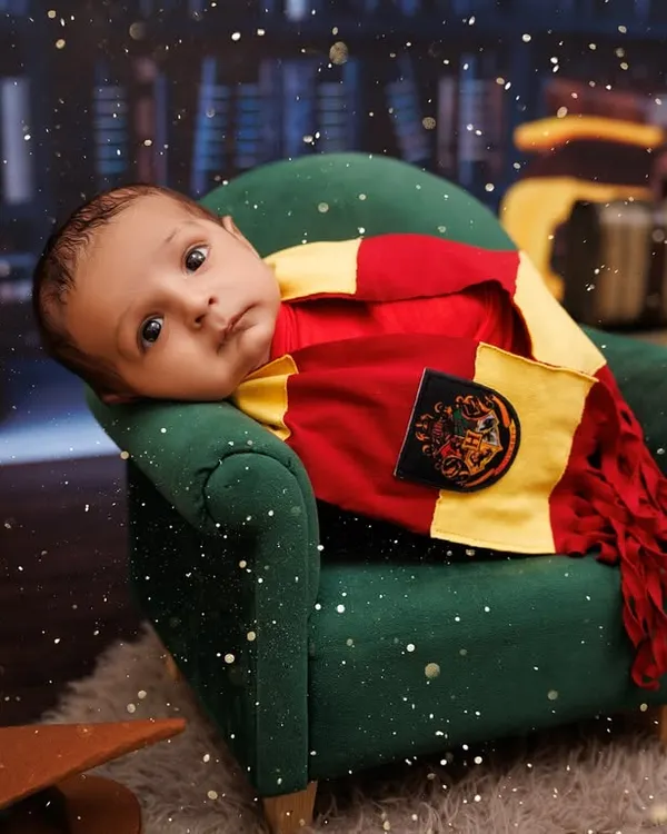 A close-up of our little wizard, looking right at the camera in his magical Harry Potter setup. The details make the theme come alive.