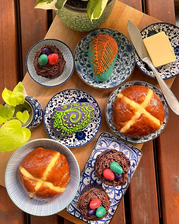 I get so hopped up on Easter cheer. Here's a look at the full spread, including my soft brioche hot cross buns, chocolate fudge nest cupcakes, and colorful marzipan eggs.