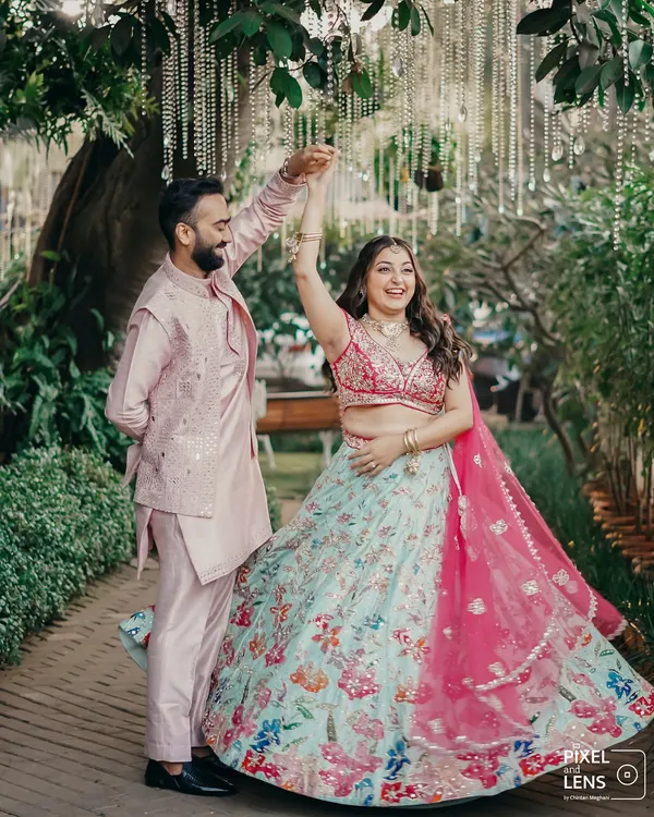 Amid a cascade of fairy lights and pastel dreams, this beautiful couple twirls into their new life together. We planned their Haldi ceremony to be a perfect picture of love, with a vibrant lehenga, an intricate sherwani, and laughter that lit up the entire garden venue.