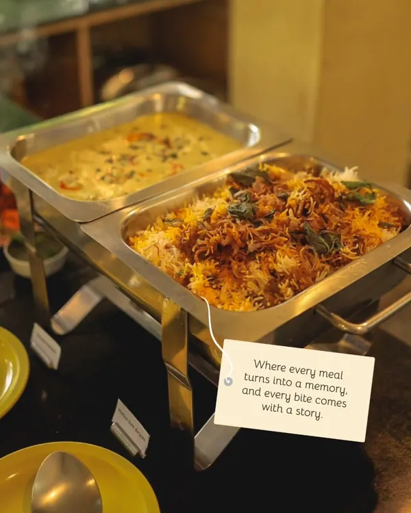 Where every meal turns into a memory. We take pride in our food, offering flavorful dishes like this aromatic biryani that tell a story of local culture and culinary passion.