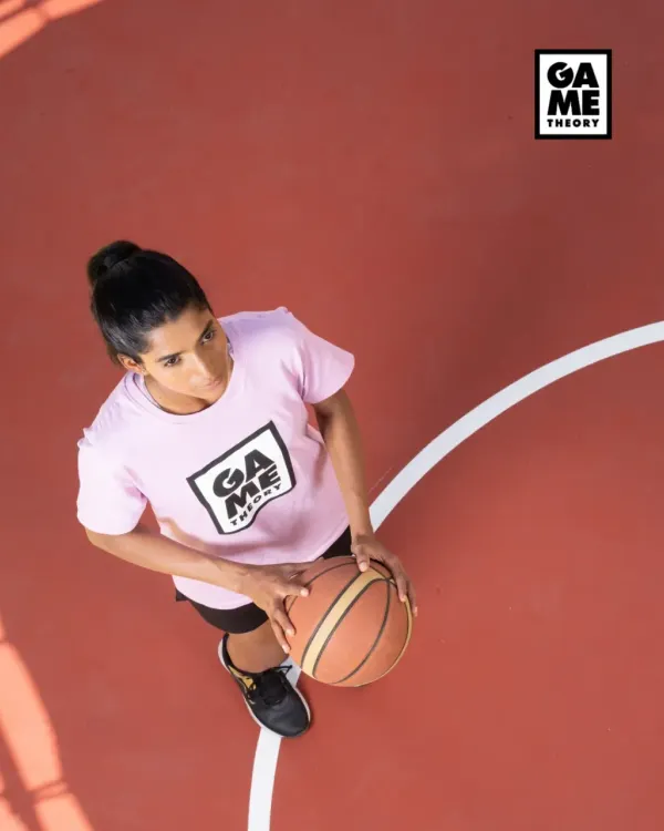 Aim higher. An overhead shot of a player ready to make her next move. Our courts are where you can focus on your vision and elevate your game.