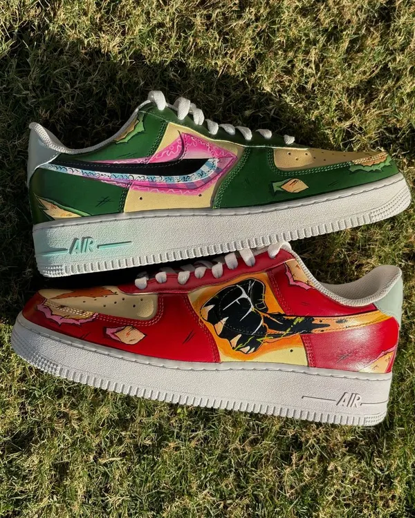 A dynamic design on Nike Air Force 1s showing Luffy in Gear 5 and Zoro in his King of Hell form, capturing the power of the Straw Hat Pirates' top fighters.