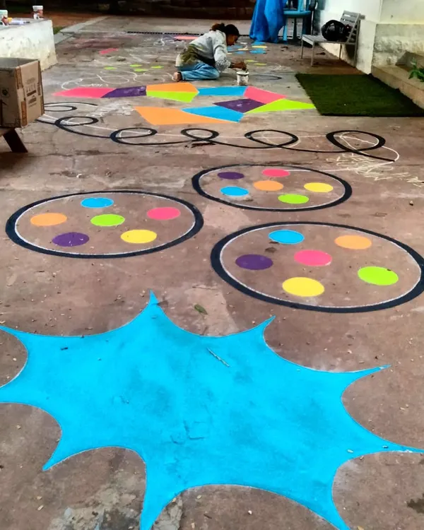 A wide view of the 45-foot epic battle-course floor mural I painted for Papagoya Micro School in Bangalore. This isn't just decoration; it's a functional art piece for play and fitness.