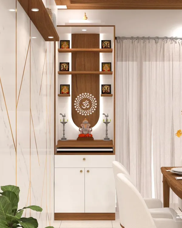 This elegant pooja unit is designed to fit seamlessly into a modern living or dining area. The backlit panel highlights the 'Om' mandala and provides a divine glow for the idols.