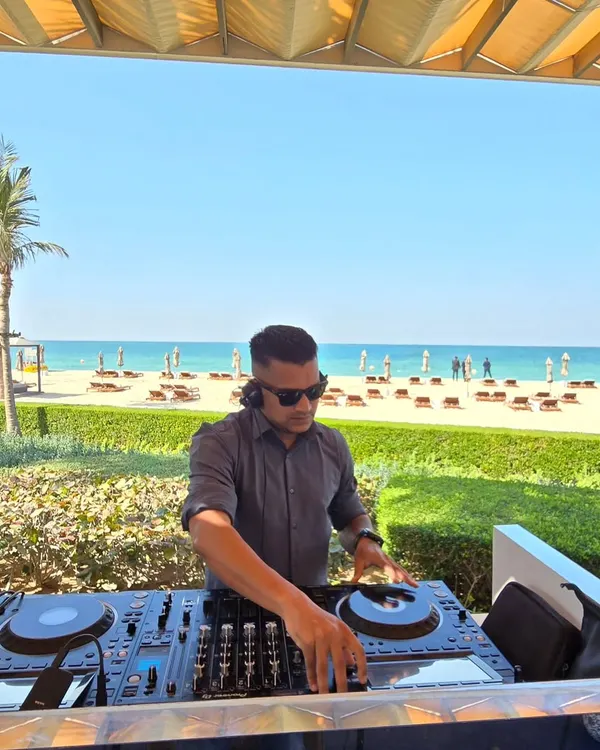 Setting the vibe for a beautiful beachside mehndi in Dubai. I specialize in destination weddings, bringing the right energy whether it's a relaxed sundowner by the sea or an all-night party.