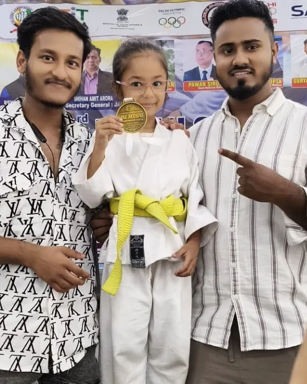 A proud moment with one of our gold medalists. This is the result of relentless practice and the fighting spirit we instill in all our students.