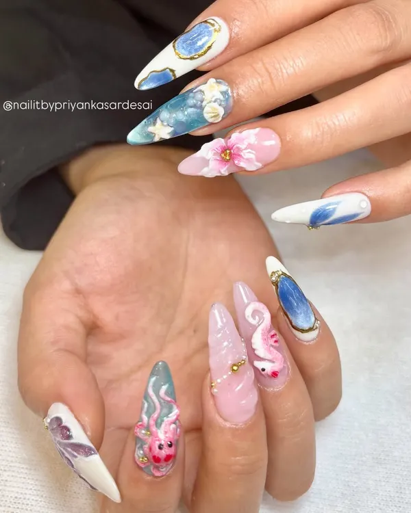 This is where your nail dreams come to life. I hand-sculpted every detail in this ocean-inspired 3D set, from the tiny seahorse and octopus to the delicate shells and florals, creating a wearable piece of art for your fingertips.