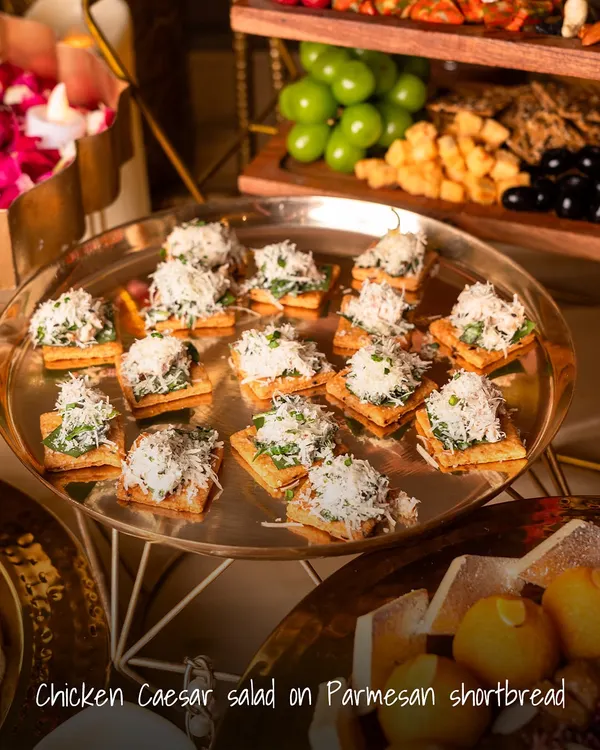 A creative twist on a classic, our Chicken Caesar Salad on Parmesan Shortbread is a perfect bite-sized appetizer. The savory shortbread provides a delicious crunch against the creamy salad.