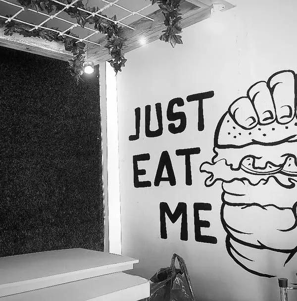 This is a hand-painted mural I designed for a cafe on Sadri Ranakpur Road. The goal was to create a bold, eye-catching piece of line art that fits the restaurant's vibe and becomes a photo spot for customers. I paint murals like this directly on the wall at your business location.