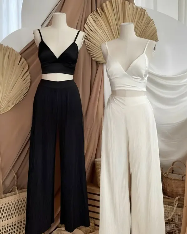 My custom co-ord sets are designed for effortless style. This set includes a minimalist bralette top paired with flowing, wide-leg trousers, creating a balanced and modern silhouette. I tailor each piece to ensure the fit is both comfortable and flattering.