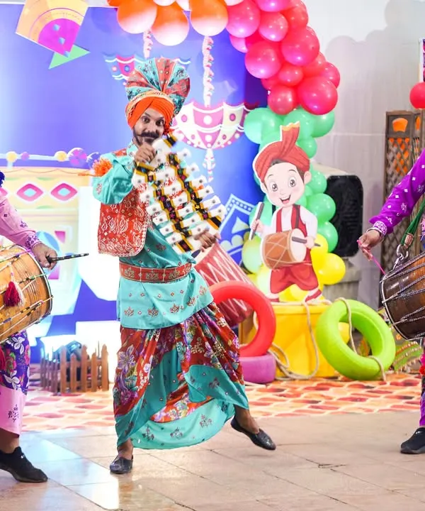 Our vibrant dhol players in traditional Punjabi attire, bringing high-energy music and a festive atmosphere to the celebration.