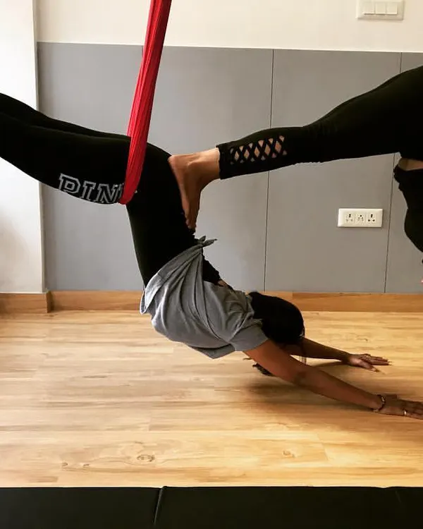 This is what connection in motion looks like. In my partner aerial yoga sessions, we use the hammock to support each other in beautiful, assisted poses like this one, building trust and strength together.