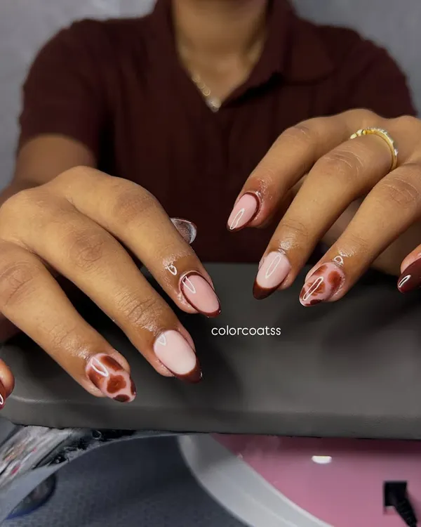 A closer look at this design combining a classic French tip with a modern animal print. In my course, I teach you how to mix and match different styles to create unique, custom nail art for any client.