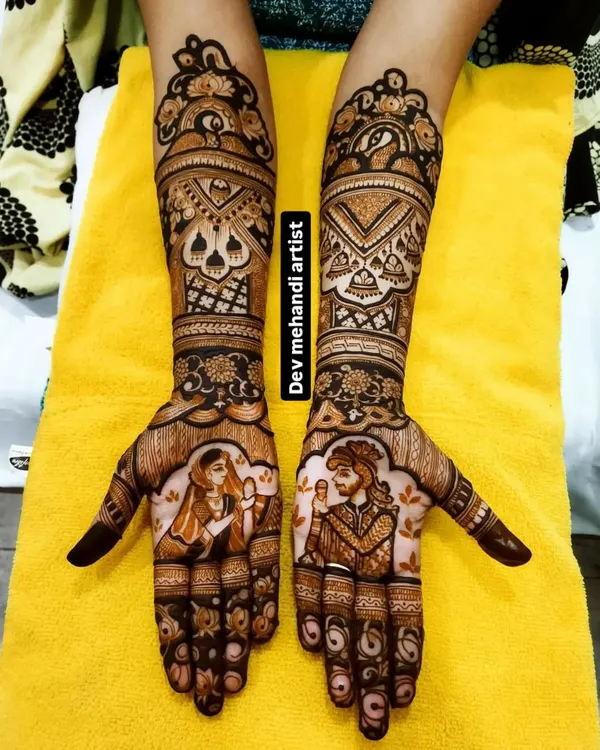 This custom design features beautiful portraits of the bride and groom on the palms. We work with you to get the details just right, making your mehndi a true piece of personal art.