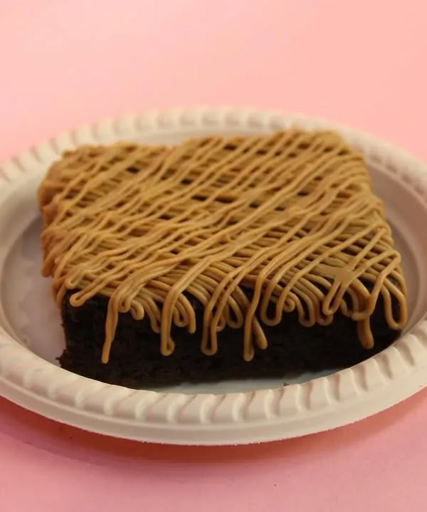 Our new Lotus Biscoff Brownie. A rich, fudgy brownie base topped with a generous drizzle of creamy Biscoff spread.