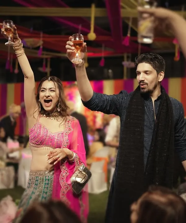 Toasts to a new beginning! The Sangeet night is for celebrating, and I'm there to capture the high spirits and unfiltered fun.
