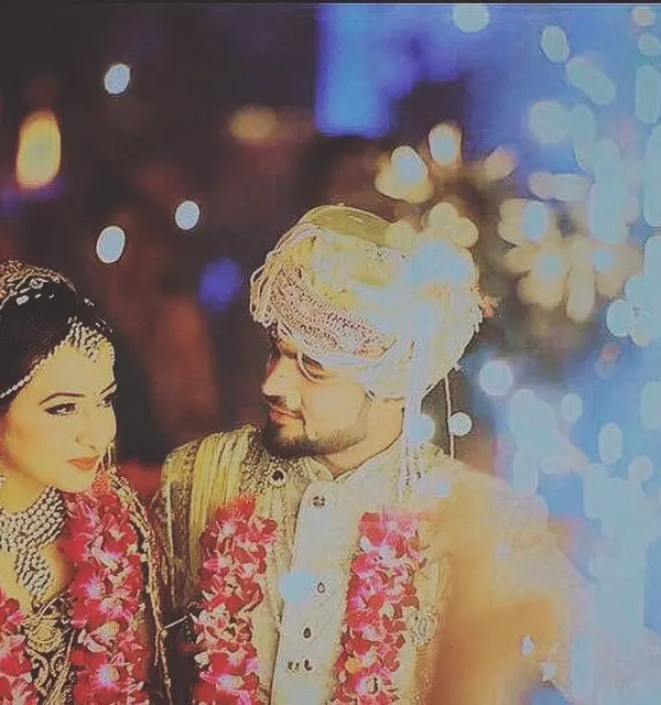 The Jaimala is a peak moment of celebration. I positioned myself to capture not just the couple's interaction, but also the energy of the event, using the background fireworks to frame them in a truly cinematic and unforgettable way.