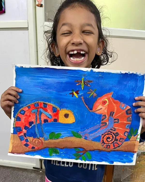 The pure, unfiltered joy of creating something you're proud of. This is what our art classes are all about, providing a space where every child can express themselves freely and find happiness in their own imagination.