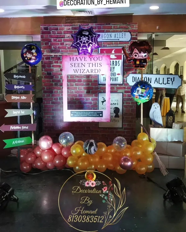 A dedicated selfie point for the Harry Potter party, featuring a "Have You Seen This Wizard?" photo frame. I included themed props like a broomstick, an owl, and Diagon Alley signposts to make the photos more fun and interactive.