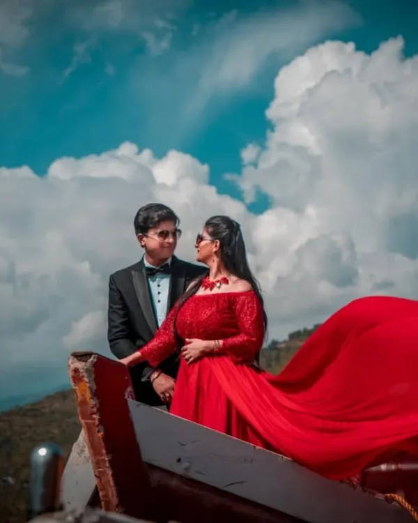 A dramatic pre-wedding shot in the mountains. We love using vibrant colors and natural landscapes to create photos that feel like a movie poster.