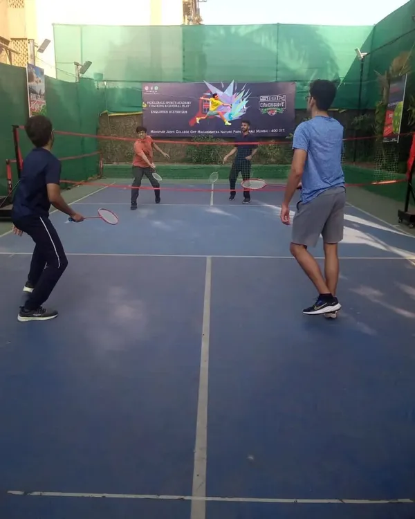 Taking the game outdoors! We also play on outdoor courts when the weather is right, bringing the same energy and passion.